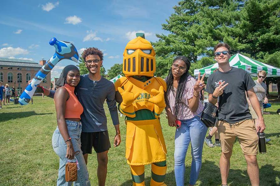 Students together with the golden knight