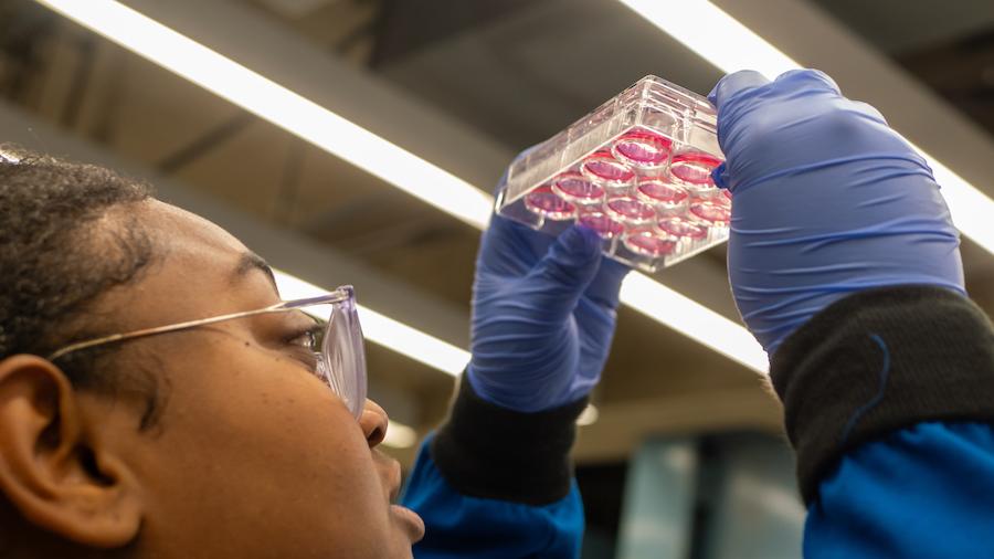 Female student in lab.